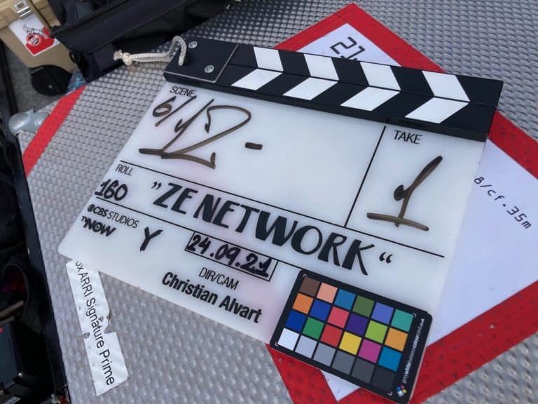 Ze Network filming slate on set