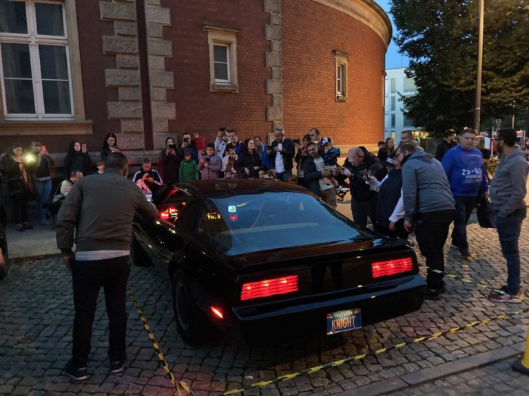 Curious people on set wanting to take a picture of KITT